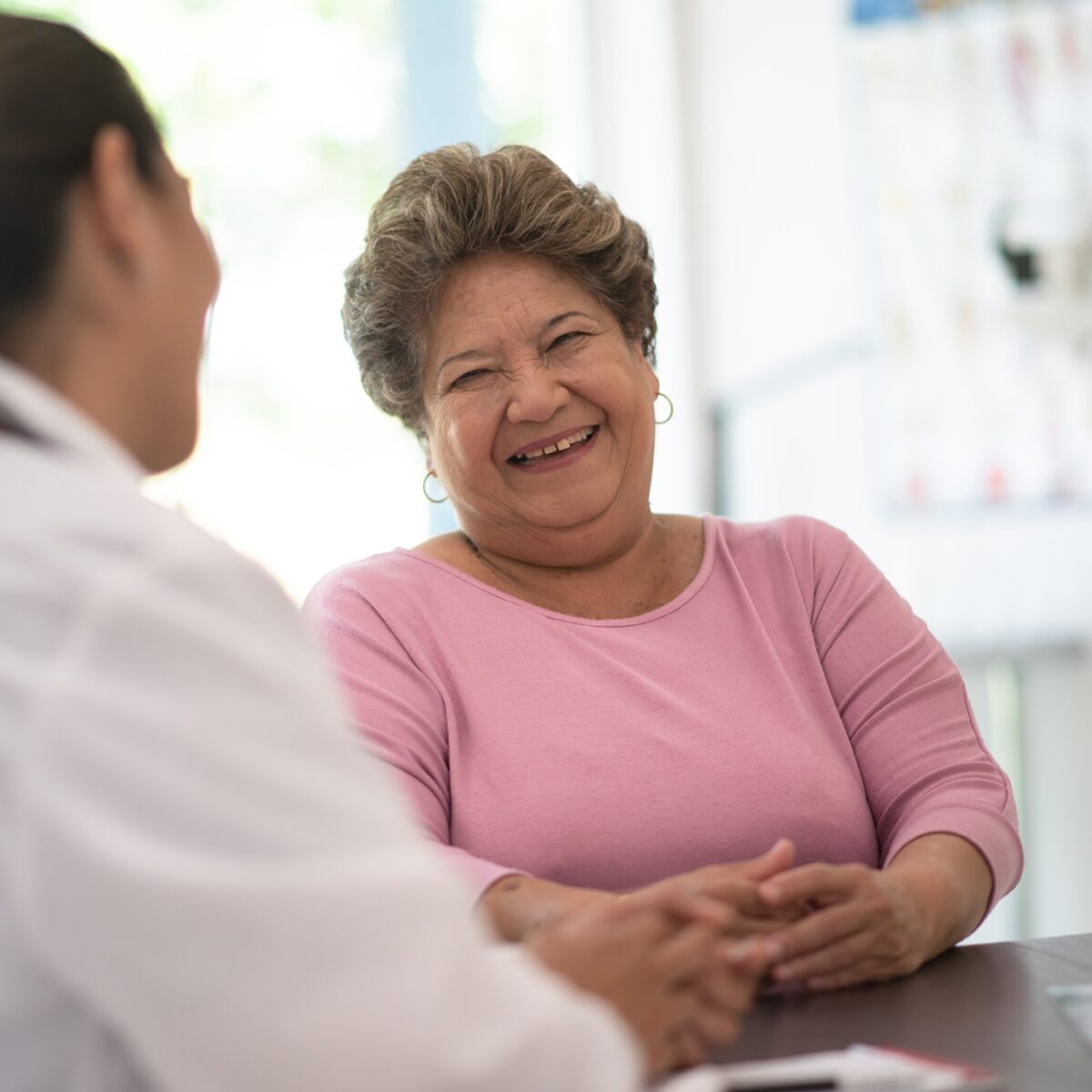 Patient talking with doctor